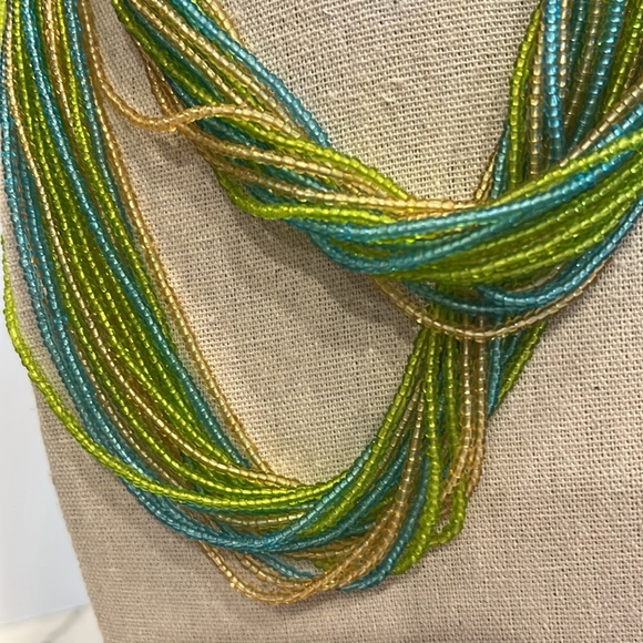 Multicolor Beaded Necklace. 17 strands measuring 34”. So many ways to style it. - Picture 7 of 9